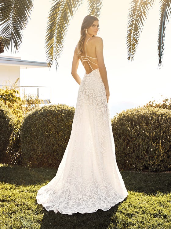 Style 66017: This romantic halter A-line wedding dress creates pure  sophistication. It feat…